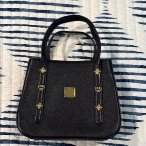 MCM Black Satchel with Gold Accents